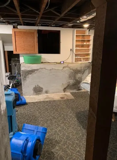 Drying equipment in a flooded finished lower level of a Calabasas, CA home