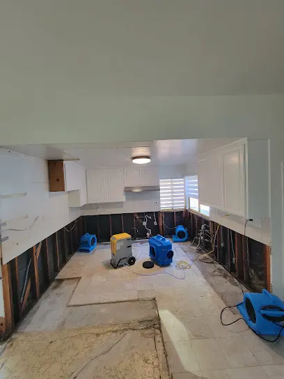 Flooring lifted to dry a slab leak in a Calabasas, CA home